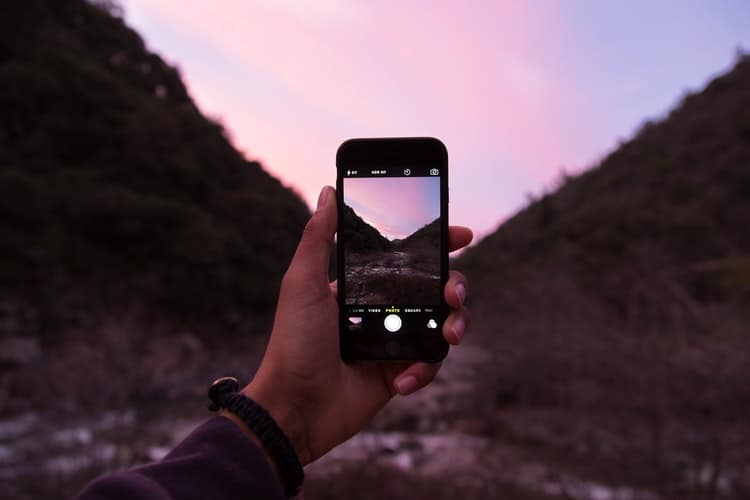 women hiking - Cell Phone Charged