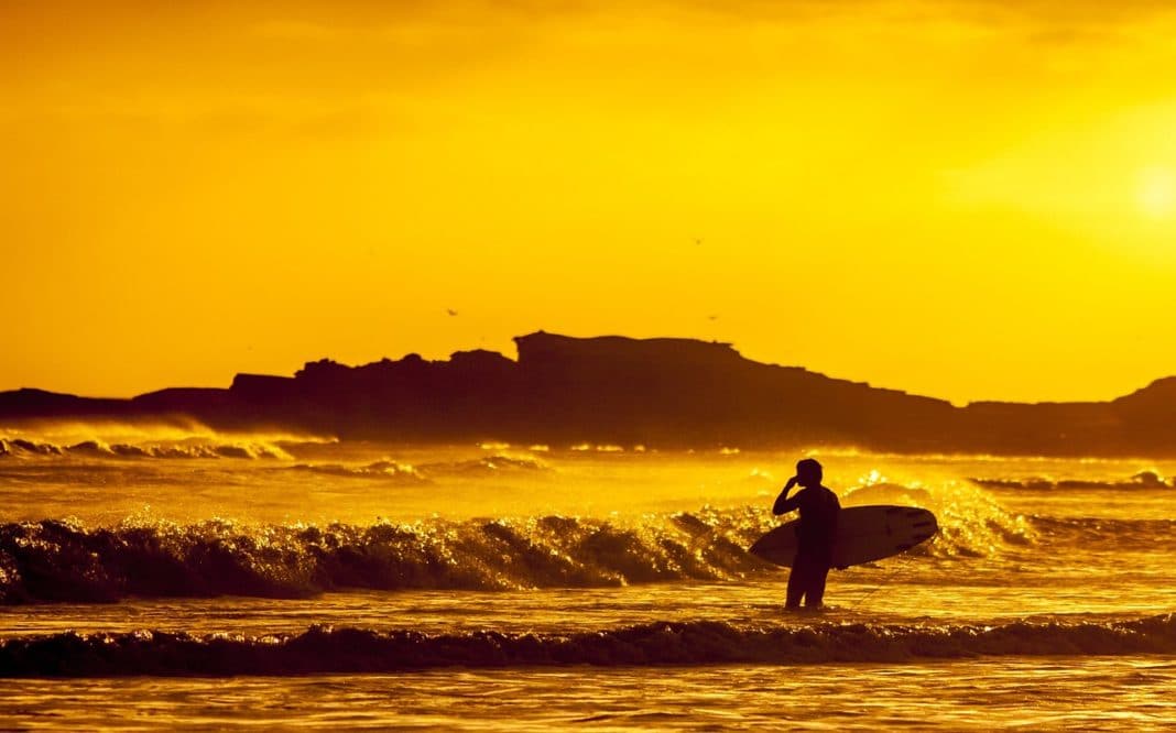 Moving to Australia - Surfer In The beach